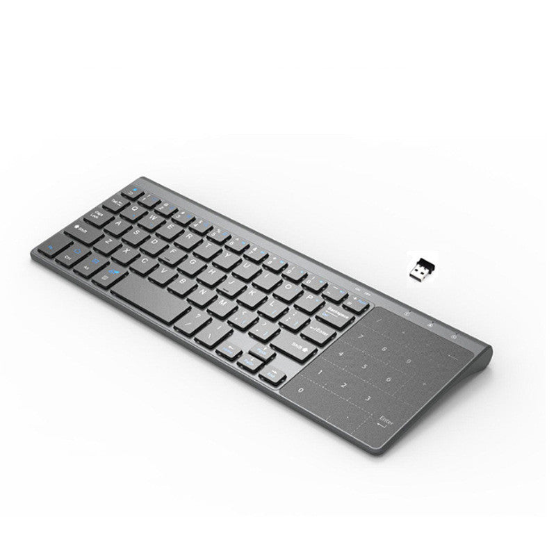 Wireless keyboard with touchpad on a white background