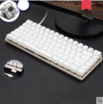 White mechanical keyboard on a dark surface with Philips logo in the background